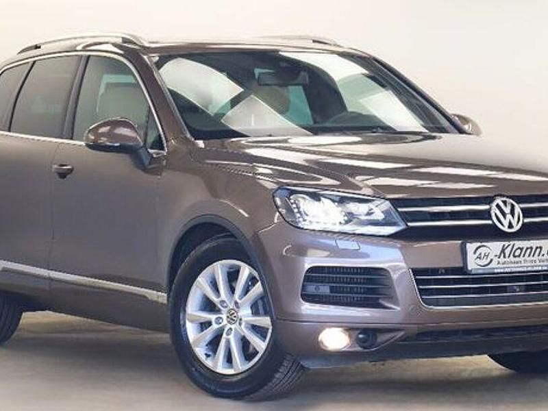 Braun Gebraucht 2013 VW Touareg Exclusive SUV | 24.499 € (Teuer) - Bild 1/4