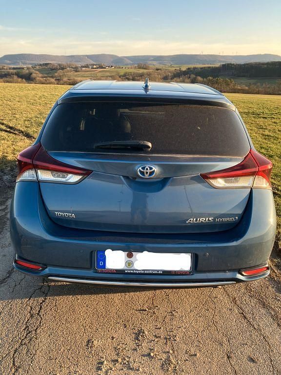 Gebraucht Toyota Auris Hybrid Executive 136 PS (100 kW) 2016 Blau Limousine