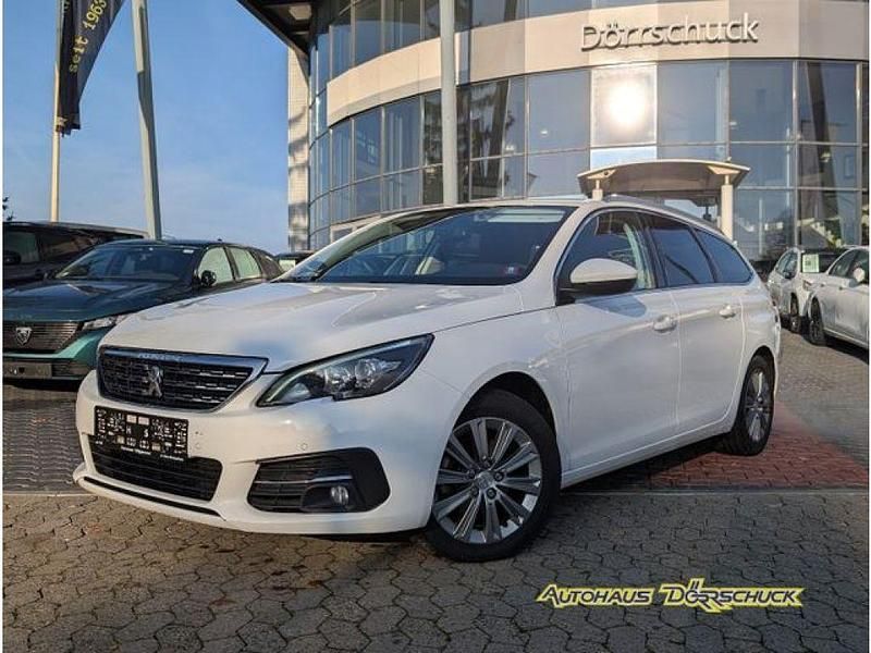 Schneeweiß Gebraucht 2021 Peugeot 308 SW Kombi | 11.990 € - Bild 1/4