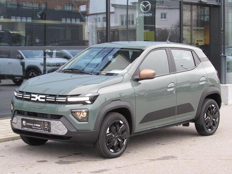 Gebraucht Dacia Spring Extreme 47 kW (65 PS) 2024 Olivgrün Kleinwagen