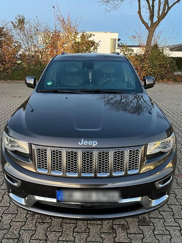 Grau Gebraucht 2014 Jeep Grand Cherokee Summit SUV | 13.700 € (Superpreis) - Bild 1/4