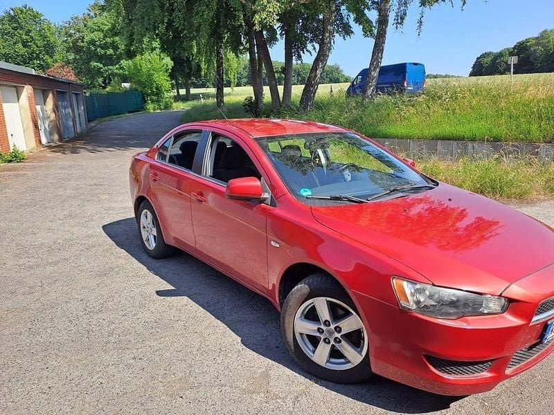 Gebraucht Mitsubishi Lancer 117 PS (86 kW) 2010 Rot Limousine