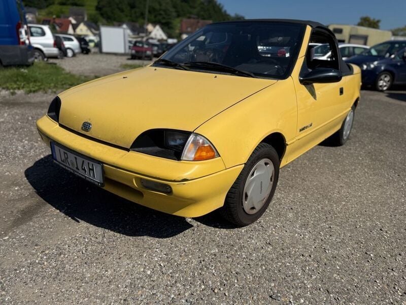 Gelb Gebraucht 1991 Suzuki Swift Cabrio | 1.400 € - Bild 1/4