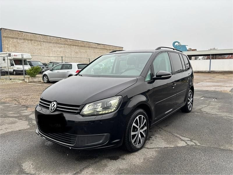 Gebraucht VW Touran 105 PS (77 kW) 2011 Schwarz Van / Kleinbus