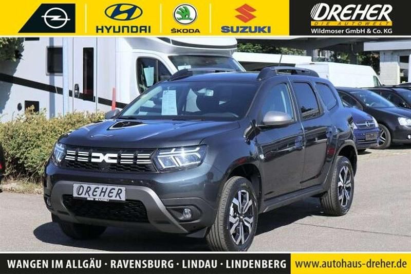 Grau "comete" Gebraucht 2024 Dacia Duster Journey SUV | 23.990 € (Fairer Preis) - Bild 1/4