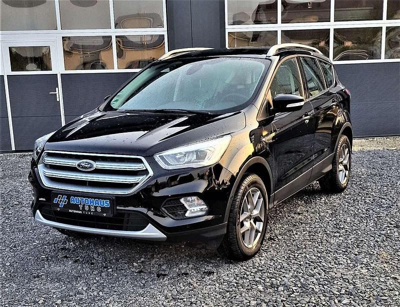 Iridiumschwarz metallic (metallic) Gebraucht 2018 Ford Kuga SUV | 17.700 € (Fairer Preis) - Bild 1/3
