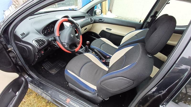Gebraucht Peugeot 206 60 PS (44 kW) 2004 Schwarz Kleinwagen