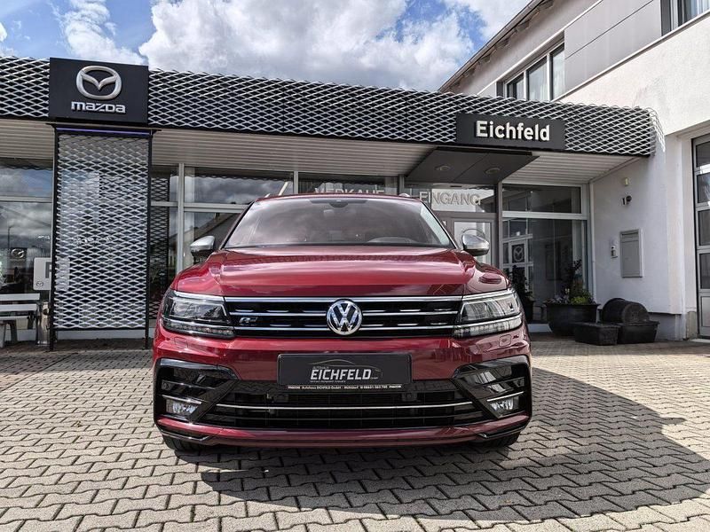 Ruby red metallic Gebraucht 2018 VW Tiguan Allspace Highline SUV | 24.890 € (Fairer Preis) - Bild 1/4