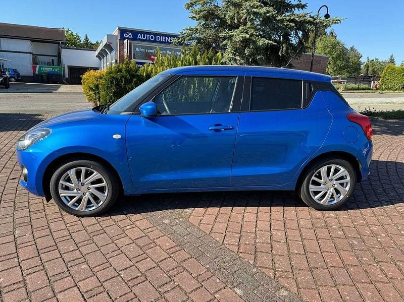 Blau Neu 2024 Suzuki Swift Comfort Limousine | 20.499 € - Bild 1/4