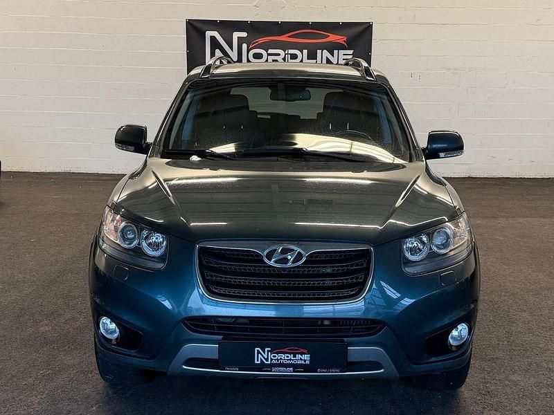 Grau Gebraucht 2011 Hyundai Santa Fe Premium SUV | 7.995 € (Fairer Preis) - Bild 1/4