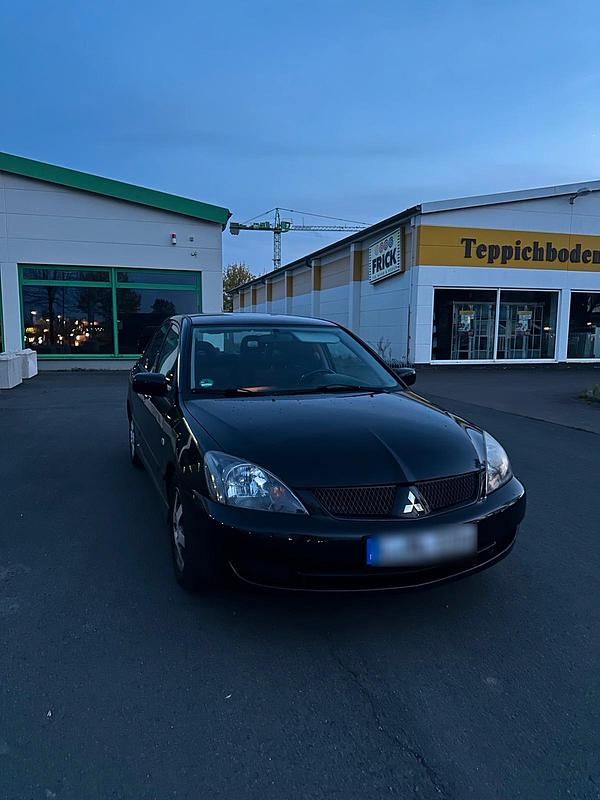 Gebraucht Mitsubishi Lancer 98 PS (72 kW) 2007 Schwarz Limousine