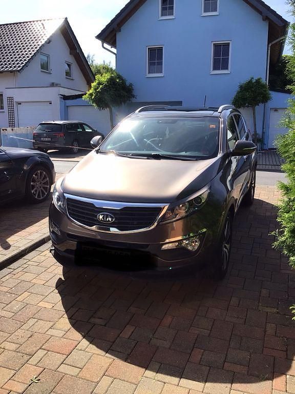 Braun Gebraucht 2014 Kia Sportage Spirit SUV | 11.900 € (Fairer Preis) - Bild 1/4