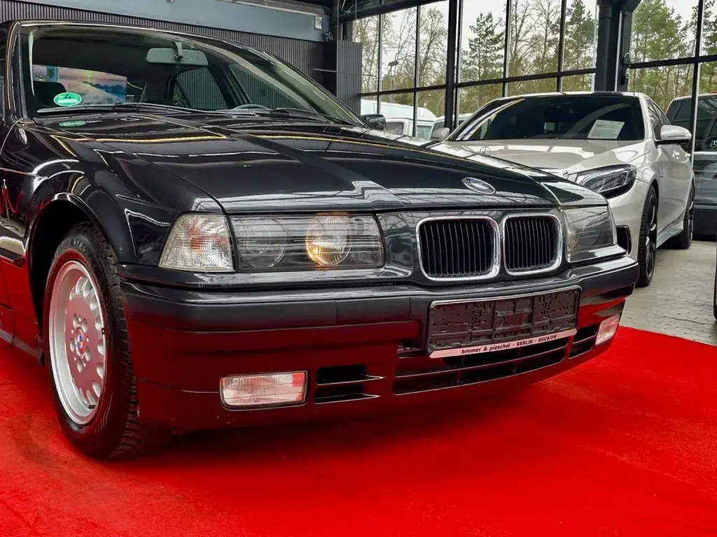 Gebraucht BMW 320 150 PS (110 kW) 1991 Schwarz Limousine