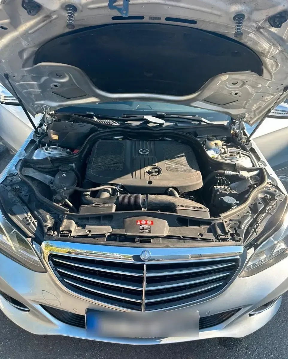 Używany Mercedes E220 170 KM (125 kW) 2015 Srebrny Kombi