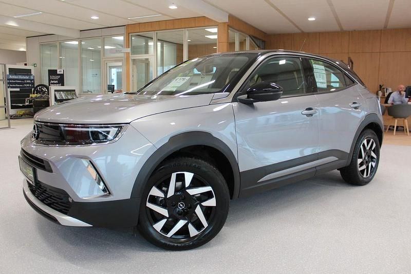 Gebraucht Opel Mokka-e Elegance 100 kW (136 PS) 2022 Kristall silber SUV