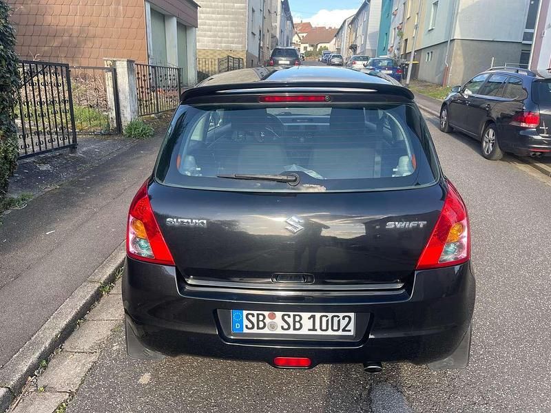 Gebraucht Suzuki Swift Club 75 PS (55 kW) 2009 Schwarz Kleinwagen