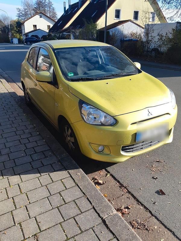 Gelb Gebraucht 2014 Mitsubishi Space Star Kleinwagen | 4.890 € (Fairer Preis) - Bild 1/4
