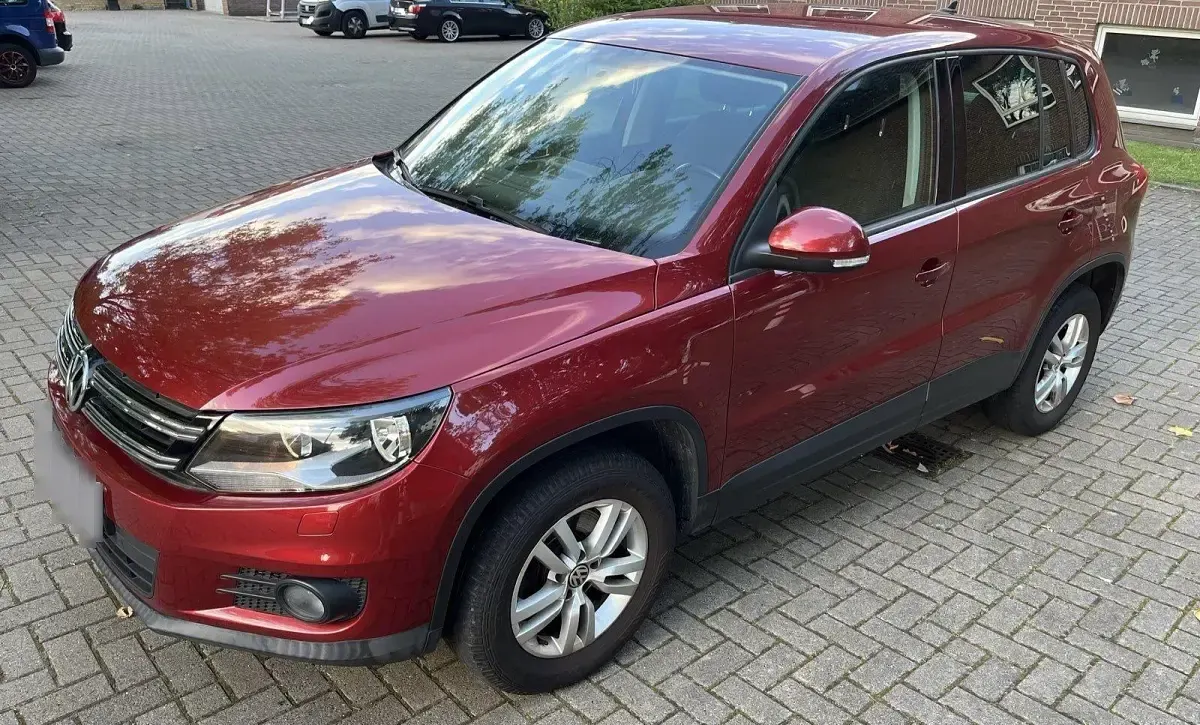 Używany VW Tiguan 122 KM (89 kW) 2012 Czerwony SUV