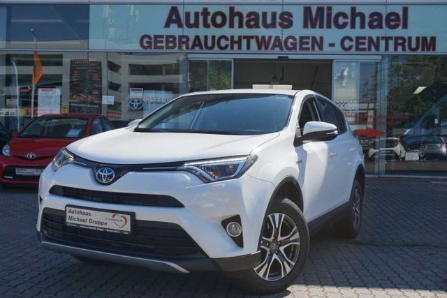 Weiß Gebraucht 2018 Toyota RAV4 Hybrid Team SUV | 23.990 € (Guter Preis) - Bild 1/4