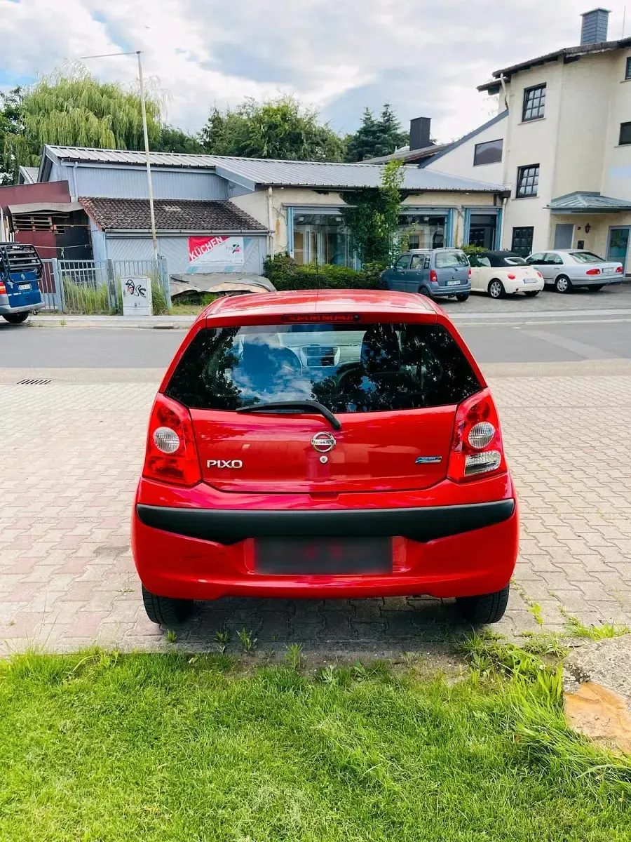 Gebraucht Nissan Pixo 68 PS (50 kW) 2010 Rot Kleinwagen