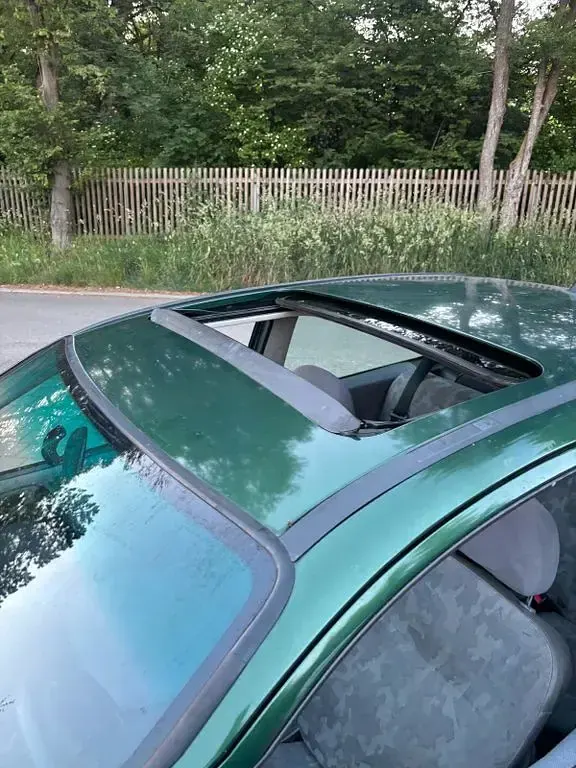 Gebraucht Opel Corsa 54 PS (39 kW) 1998 Grün Kleinwagen