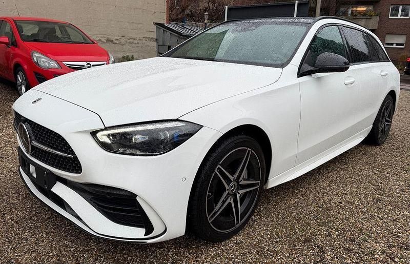 Weiß Gebraucht 2022 Mercedes C300e AMG Kombi | 30.900 € (Guter Preis) - Bild 1/4