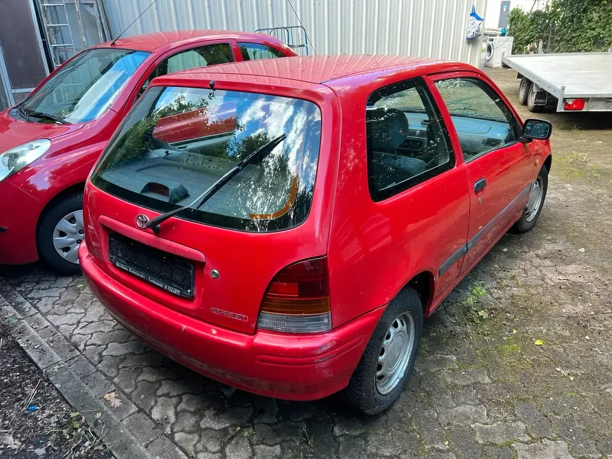 Gebraucht Toyota Starlet 55 PS (40 kW) 1997 Rot Kleinwagen