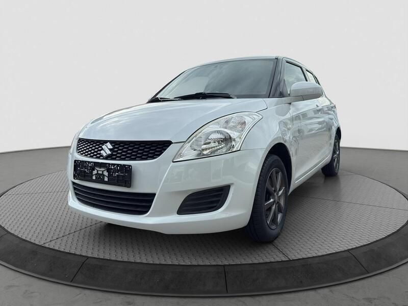 Weiß Gebraucht 2013 Suzuki Swift Club Kleinwagen | 8.790 € (Etwas zu teuer) - Bild 1/4