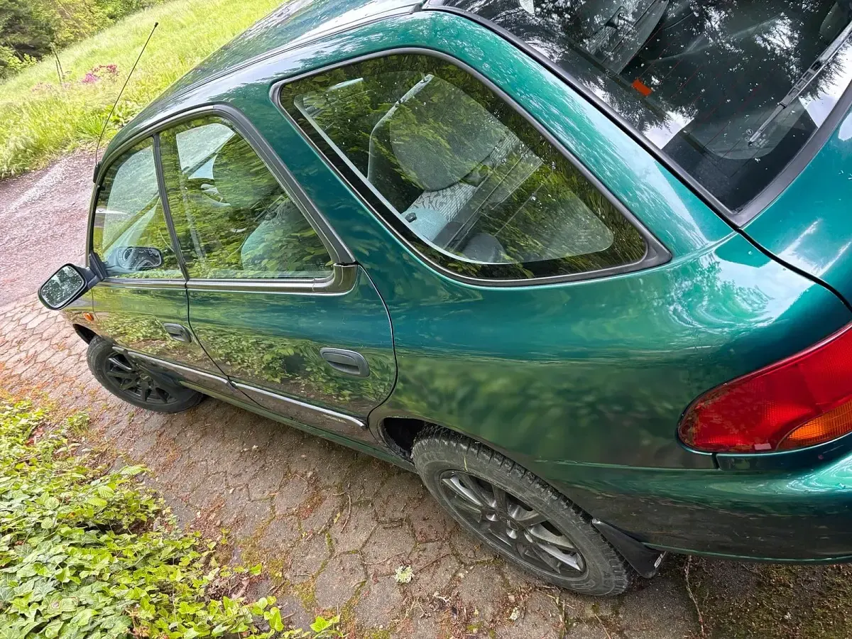 Gebraucht Subaru Impreza 95 PS (69 kW) 1997 Grün SUV