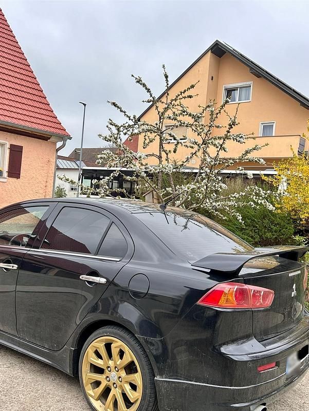 Second-hand Mitsubishi Lancer 140 CP (102 kW) 2009 Negru Berlinǎ
