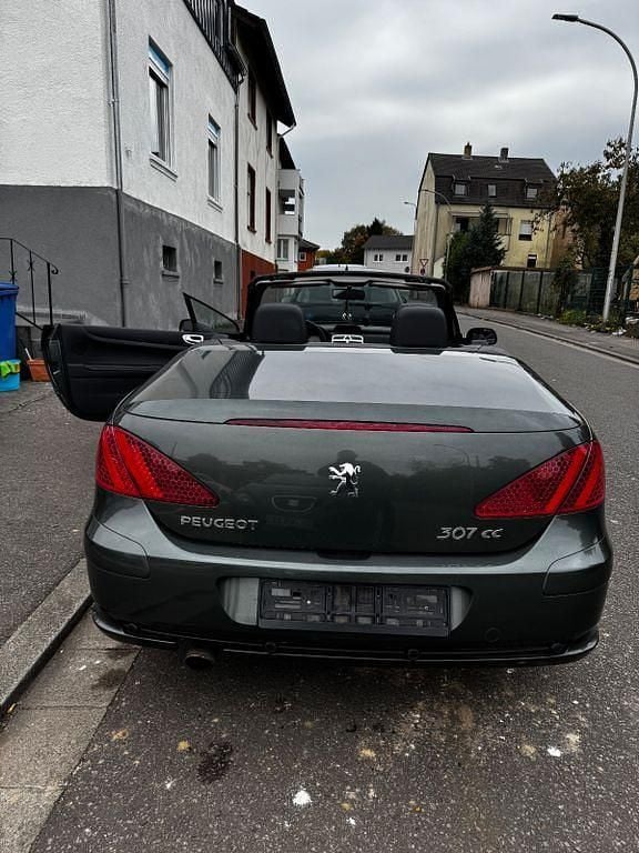 Grün Gebraucht 2006 Peugeot 307 CC Filou Cabrio | 1.000 € (Superpreis) - Bild 1/4