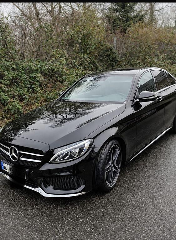 Schwarz Gebraucht 2017 Mercedes C250 AMG line Limousine | 22.900 € (Fairer Preis) - Bild 1/4