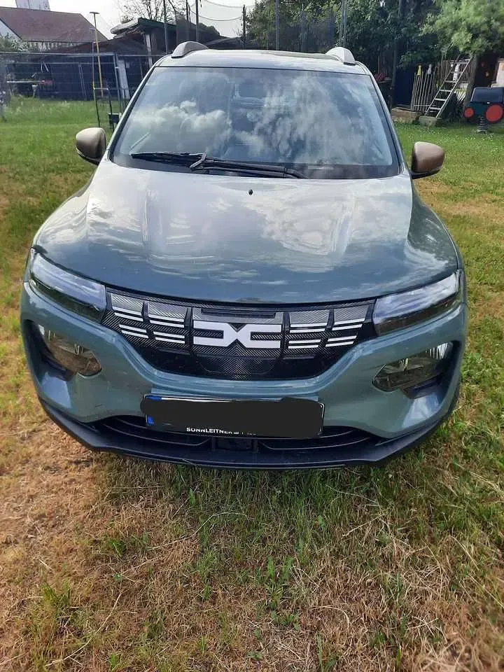 Gebraucht Dacia Spring Extreme 47 kW (65 PS) 2023 Grün Kleinwagen