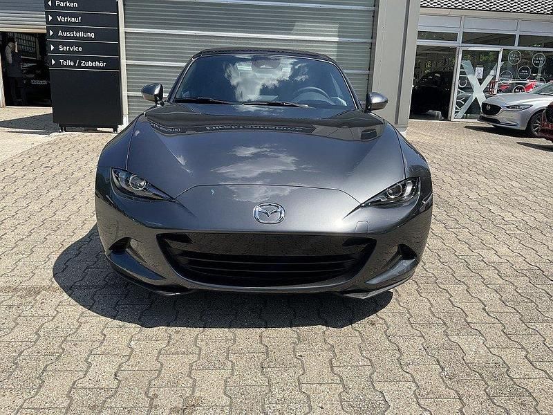 Machine gray Neu 2025 Mazda MX5 Exclusive-Line Cabrio | 31.990 € - Bild 1/4