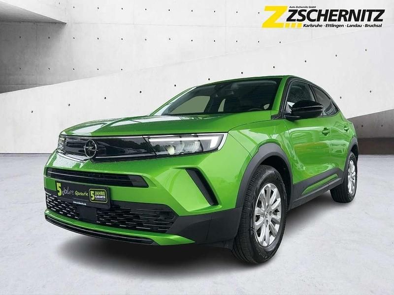 Matcha green/ikone gruen Gebraucht 2023 Opel Mokka Edition SUV | 17.380 € (Fairer Preis) - Bild 1/4