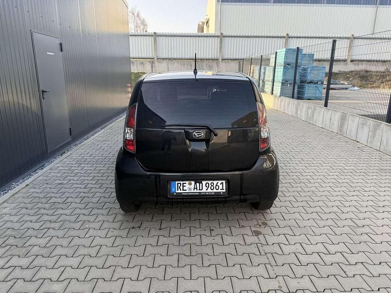 Gebraucht Daihatsu Sirion 70 PS (51 kW) 2010 Schwarz Kleinwagen
