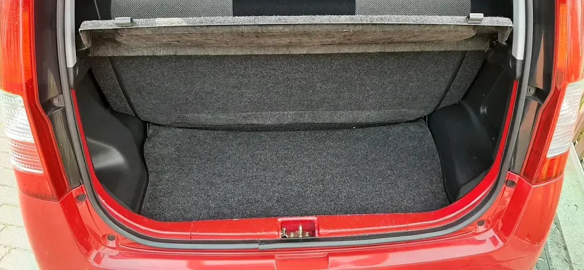 Gebraucht Daihatsu Cuore 59 PS (43 kW) 2006 Rot Kleinwagen