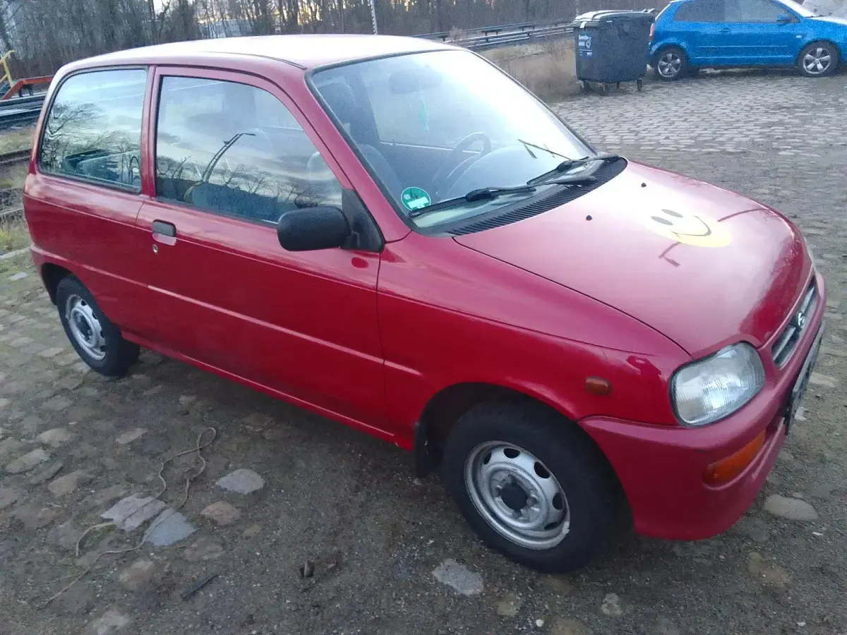Gebraucht Daihatsu Cuore 43 PS (31 kW) 1998 Rot Kleinwagen