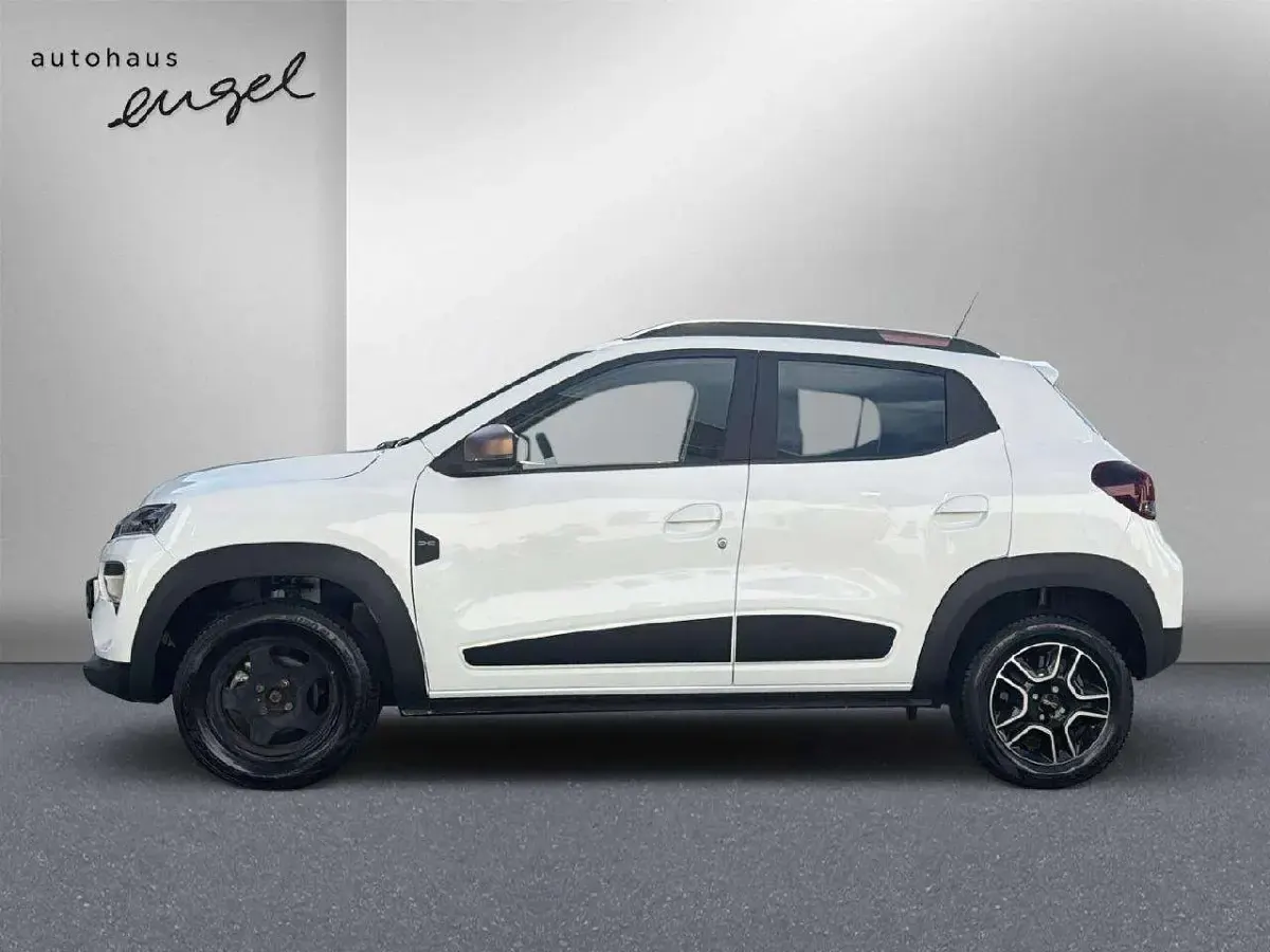 Gebraucht Dacia Spring Extreme 47 kW (65 PS) 2023 Polarweiss Kleinwagen