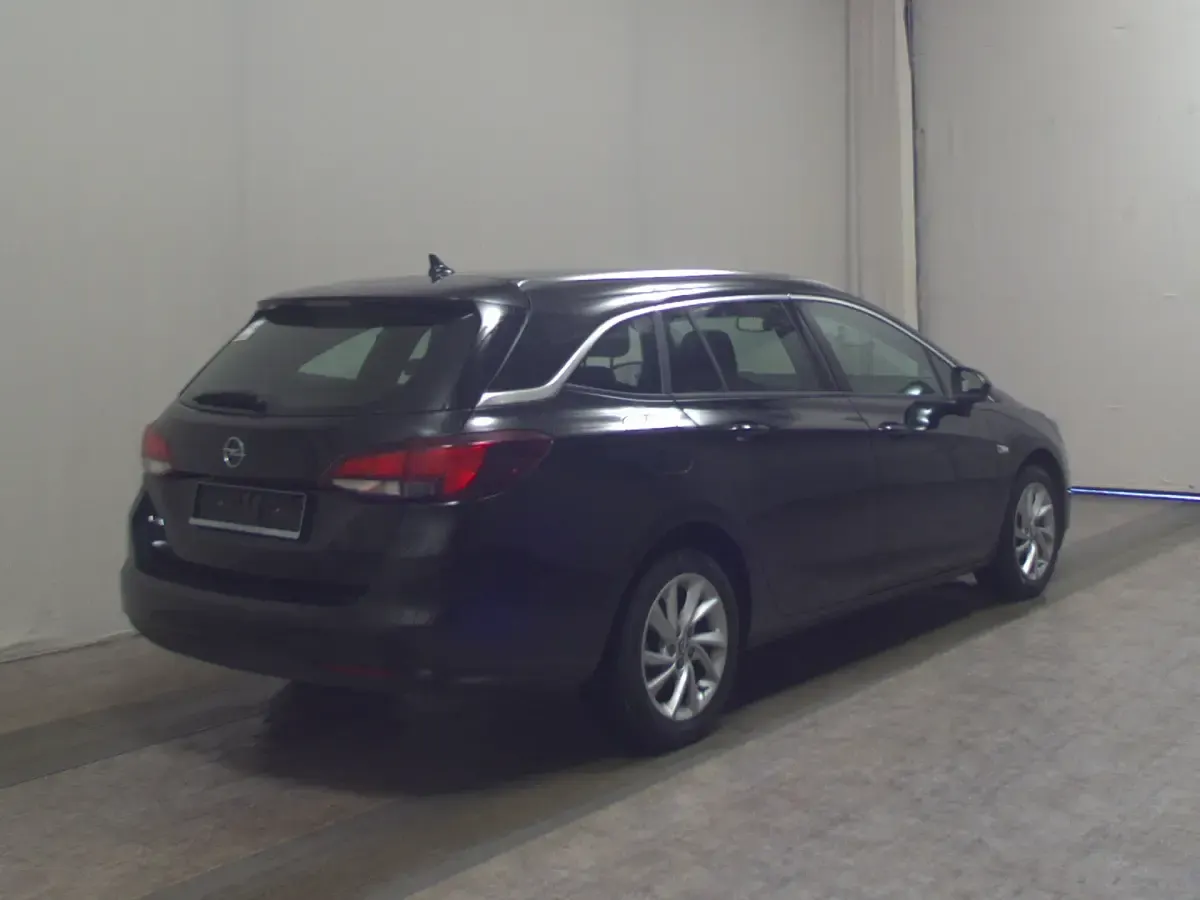 Używany Opel Astra Elegance 110 KM (80 kW) 2021 Czarny Kombi