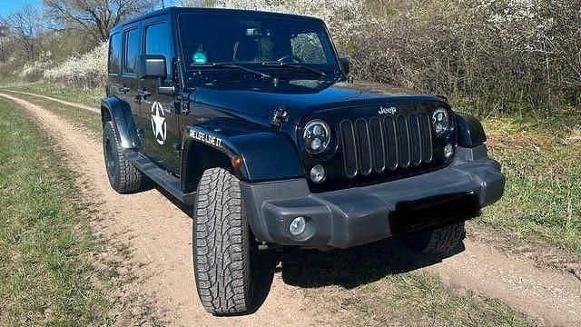 Schwarz Gebraucht 2015 Jeep Wrangler Sahara SUV | 31.300 € (Fairer Preis) - Bild 1/4