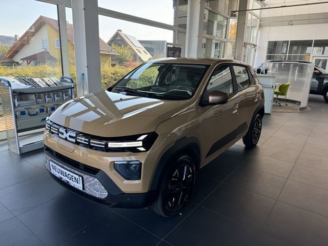 Safaribeige Gebraucht 2023 Dacia Spring Extreme Kleinwagen | 21.890 € - Bild 1/4