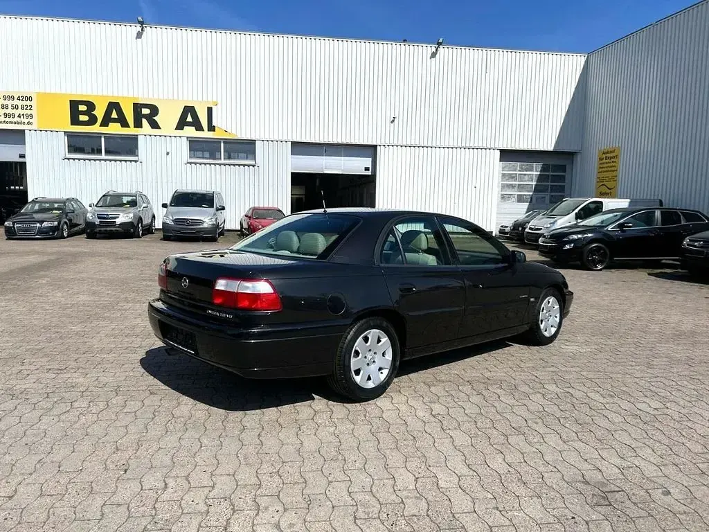 Gebraucht Opel Omega Elegance 179 PS (131 kW) 2001 Schwarz Limousine