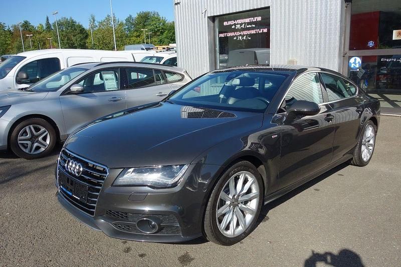 Grau Gebraucht 2011 Audi A7 Sportback Ambiente Kleinwagen | 11.890 € (Guter Preis) - Bild 1/4