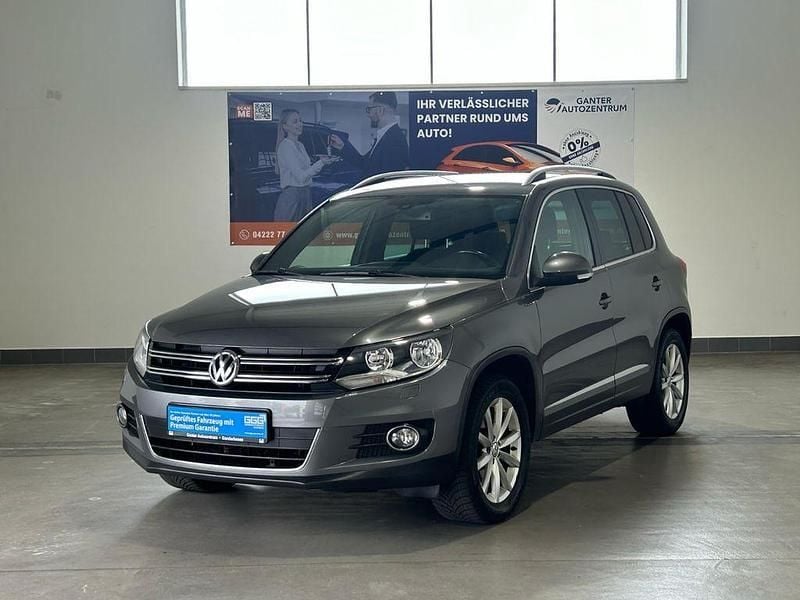 Grau Gebraucht 2015 VW Tiguan LOUNGE SUV | 15.450 € (Fairer Preis) - Bild 1/3