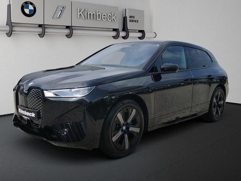 Saphirschwarz metallic Gebraucht 2024 BMW iX Sport Line SUV | 49.980 € (Superpreis) - Bild 1/4