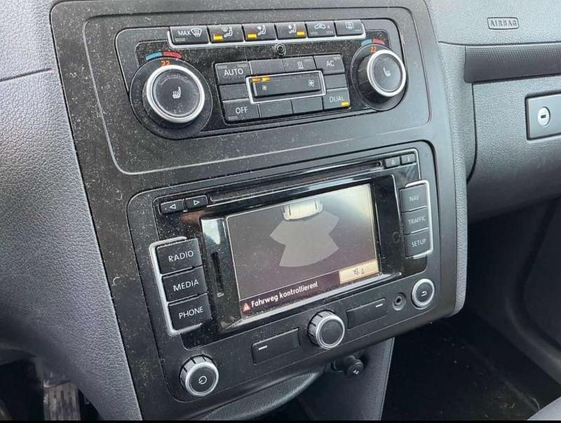 Gebraucht VW Caddy Trendline 102 PS (75 kW) 2011 Lavarot metallic Van / Kleinbus