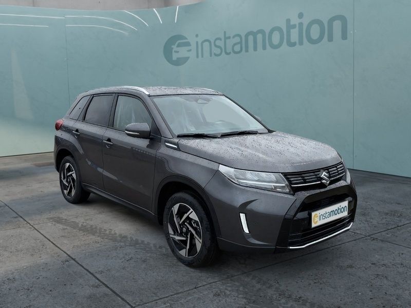 Grau Gebraucht 2024 Suzuki Vitara Comfort+ SUV | 26.480 € (Guter Preis) - Bild 1/3