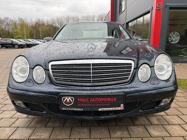Second-hand Mercedes E200 122 CP (89 kW) 2003 Negru Berlinǎ