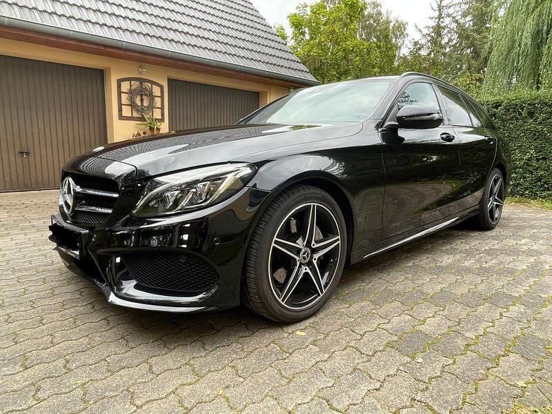 Schwarz Gebraucht 2018 Mercedes C220 AMG line Plus Kombi | 20.800 € (Guter Preis) - Bild 1/4